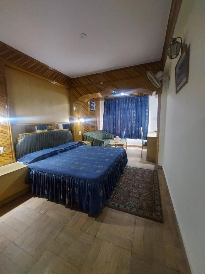 Brightland Hotel Shimla Esterno foto