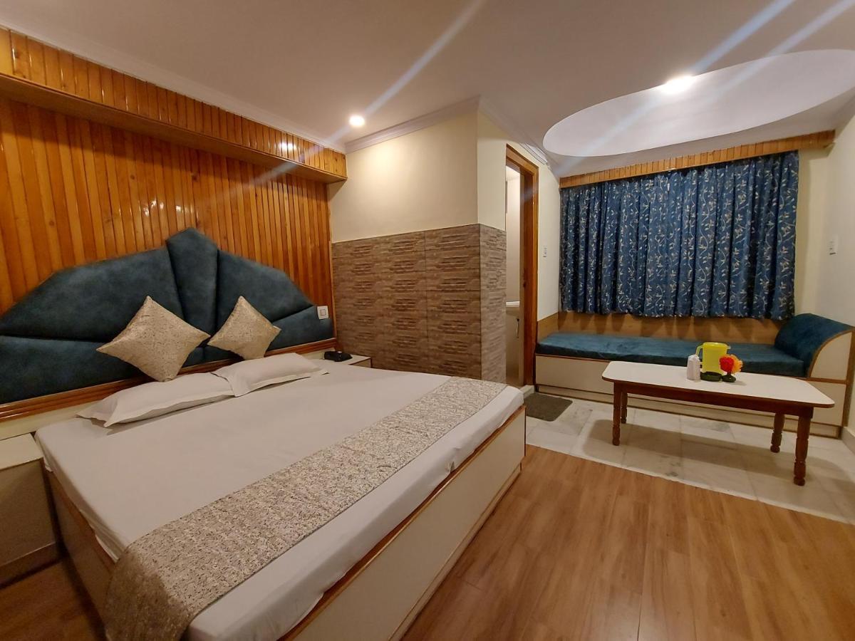 Brightland Hotel Shimla Esterno foto